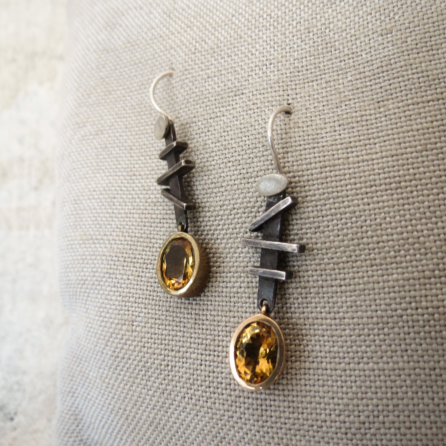 Blackened sterling silver earrings with bronze oval citrine drops