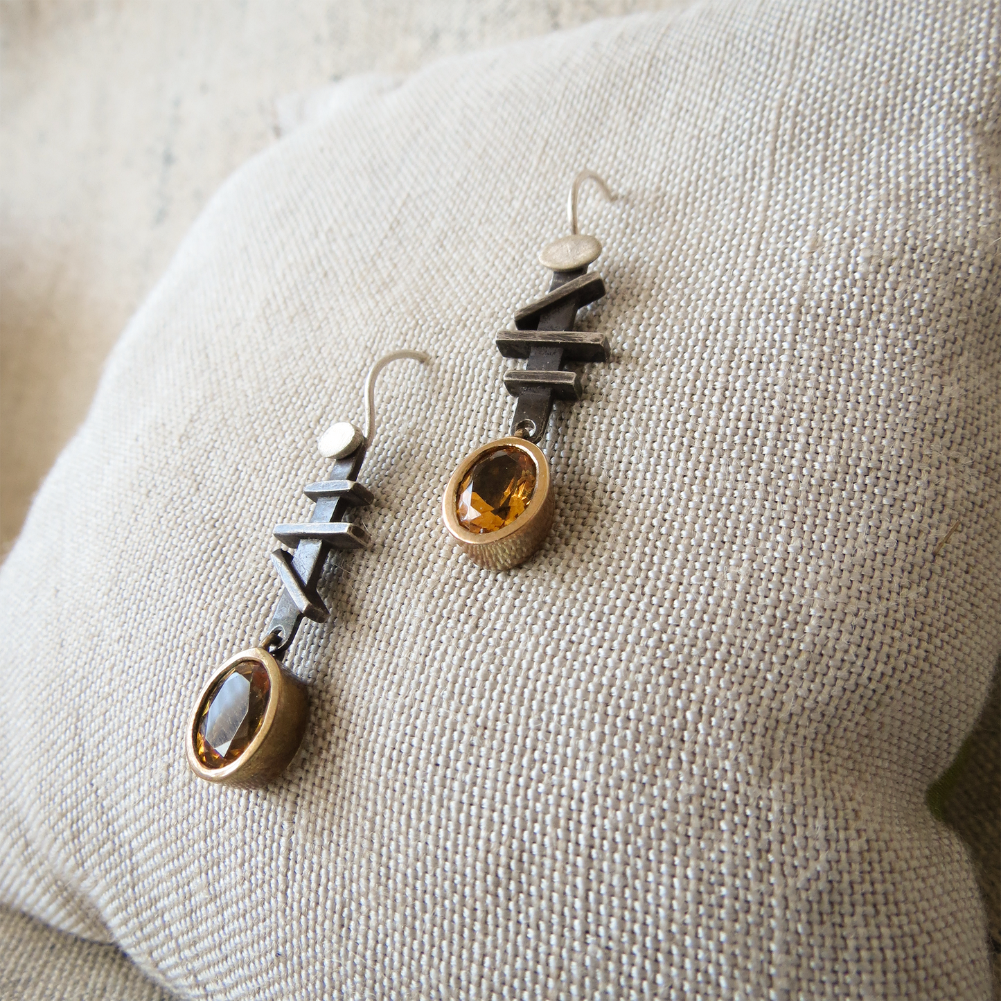 Blackened sterling silver earrings with bronze oval citrine drops